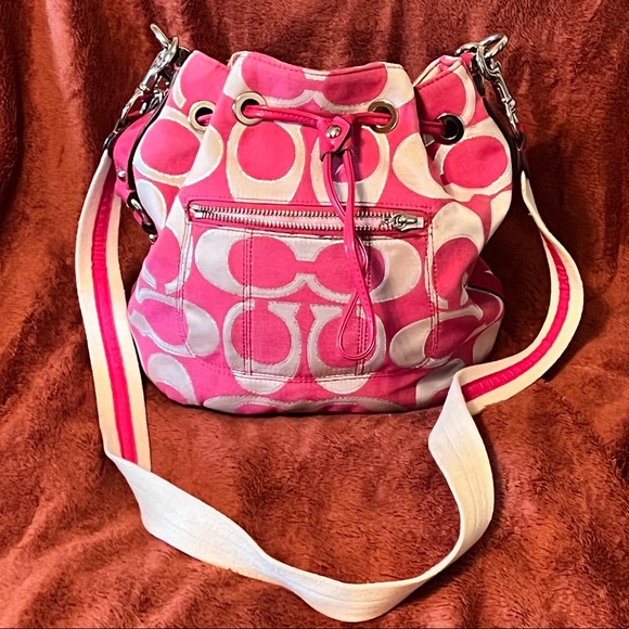 Coach Handbags - Pink Coach signature bucket bag